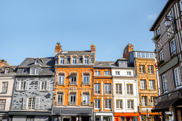 Fototapeta na wymiar Beautiful facades of the old buildings in the central square in Honfleur, famous french town in Normandy
