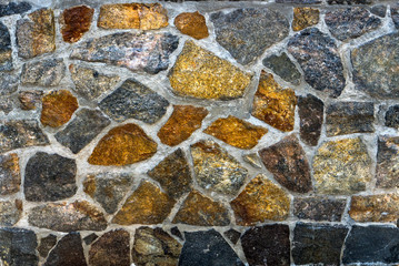 Texture of the stone wall of the house