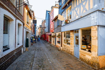 Fototapeta na wymiar Street view with ancient wooden buildings in Honfleur, famous french town in Normandy
