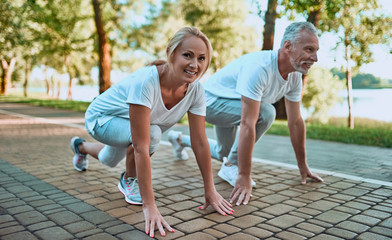 Senior couple doing sport outdoors