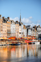 Waterfront with beautiful old buildings in Honfleur, famous french town in Normandy - obrazy, fototapety, plakaty