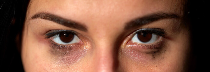 Naklejka premium mental health problem and domestic violence concept - eyes of unhappy crying woman