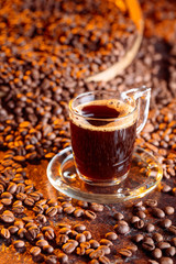 Espresso coffee cup with coffee beans.