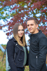 Funny couple laughing with a white perfect smile