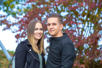 Funny couple laughing with a white perfect smile