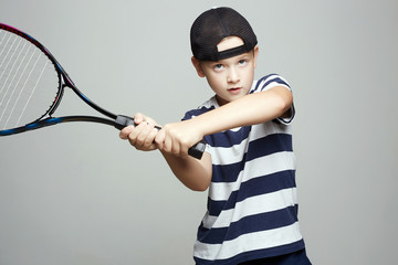 Child Boy Playing Tennis. Sport kids