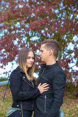 Funny couple laughing with a white perfect smile