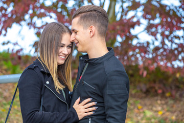 Funny couple laughing with a white perfect smile