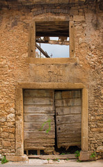 Fototapeta na wymiar A building in the historic village of Vodnjan (also called Dignano) in Istria, Croatia 