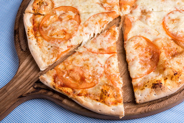 fresh and tasty italian food pizza Margherita with cheese and tomatoes