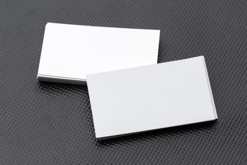 Branding mock up. Blank corporate stationery set on black paper background.