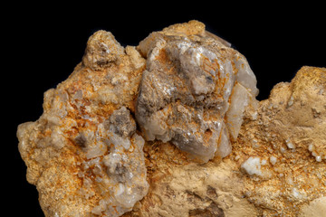 Macro mineral stone Snow quartz with calcite on a black background