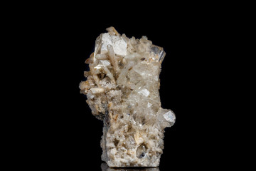 Macro mineral stone fluorite with quartz against black background