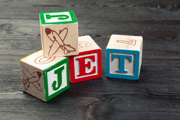 Jet printed on three wooden dice. Transportation concept