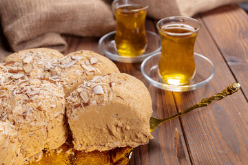 Tasty halva with tea on the table