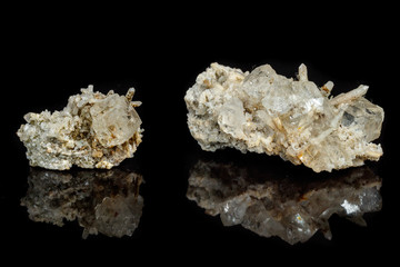 Macro mineral stone fluorite with quartz against black background