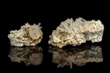 Macro mineral stone fluorite with quartz against black background