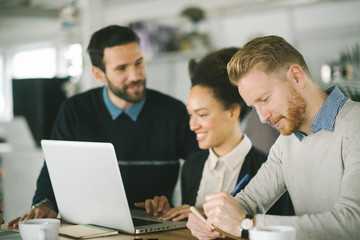 Young business people in modern office