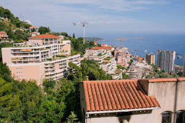High iron construction crane in the city center in the South of France