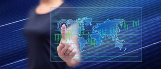 Woman touching a global business concept
