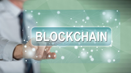 Man touching a blockchain concept