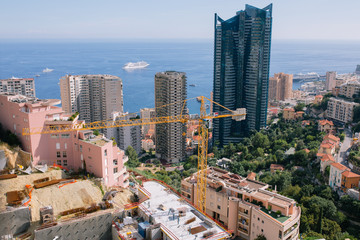 High iron construction crane in the city center in the South of France Monaco