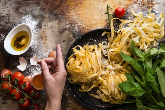 Tagliatelle, tomatoes, herbs and eggs
