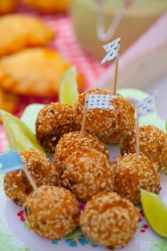 Fish balls with celery, onion and sesame for a picnic