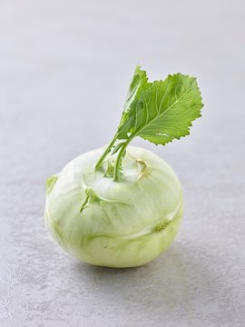 A kohlrabi with leaves