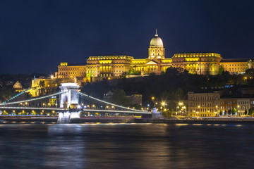 Fototapeta na wymiar Royal palace and Chain bridge over Danube river at night, Budapest, Hungary