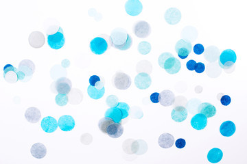 Colorful confetti on white background. Festive concept.