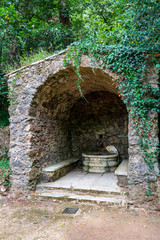 Old well on the grounds of the Bussaco Palace park