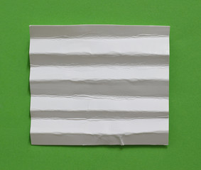 Torn paper background, empty space for text.