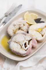 boiled fish with lemon and olive oil