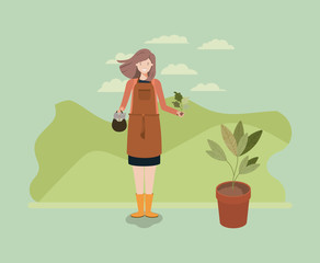 woman planting tree in the park