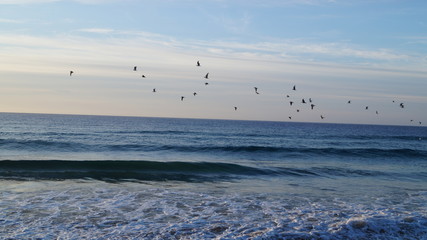 Guanacaste Province Beach in Cost Rica showing sand waves foam