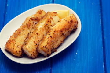 fried strips cuttlefish on white dish