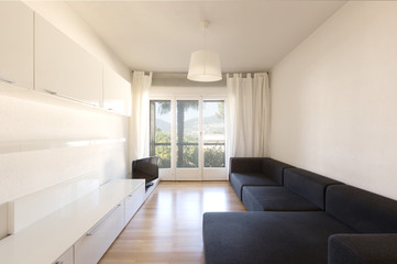 Living room with dark couch