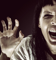 Halloween scary brunette woman with long hair