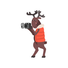 Deer in warm vest taking pictures with a camera, funny animal cartoon character traveling on vacation vector Illustration on a white background