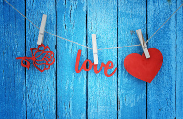 love / valentines day card with wooden heart ,rose and word "love"