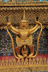 Fototapeta premium Statue and external decoration in Wat Phra Kaew temple complex, Royal Palace, Bangkok, Thailand