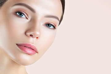 Fototapeta premium Young beautiful woman with clean perfect skin close-up