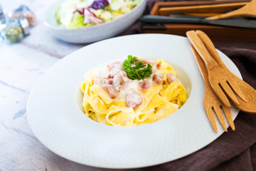 tasty Carbonara pasta on the table
