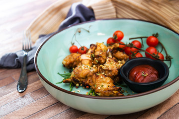 roasted sleeves chicken with potatoes and barbecue sauce