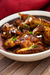 roasted sleeves chicken with potatoes and barbecue sauce