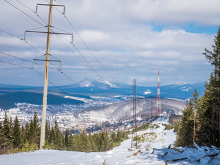 power line high in the mountains. winter frosty weather. difficult working conditions. energy in extreme conditions