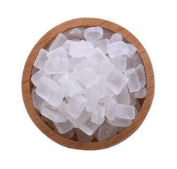 Crystalline sugar in bowl on white background