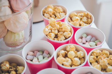 Marshmallow, popcorn. Candy Bar. Delicious sweet buffet.