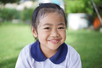 Portrait of a girl smile,Asian little girl in student uniform